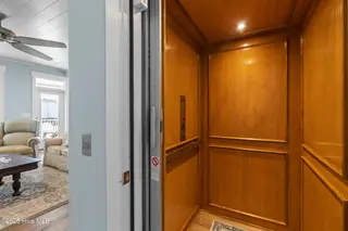 3604 W Pelican Drive, Oak Island, NC 28465 – photo 12: Trimmed Elevator