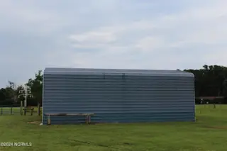 4507 Rivershore Drive, New Bern, NC 28560 – photo 24: Camper Shelter 41x18 with 30 amp hookup