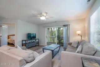 3350 Club Villas Drive 104, Southport, NC 28461 — 2-bedroom condo in St James, Southport, NC, photo 12 of 34: Great Entertaining Space