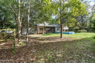 1961 Gastonia Road, Southport, NC 28461 — 3-bedroom home in Boiling Spring Lakes, Southport, NC, photo 24 of 25: Rear view of house