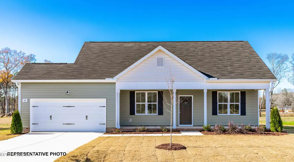 633 Springtooth Drive, Zebulon, NC 27597 – photo 1 of 8: Representative Photo