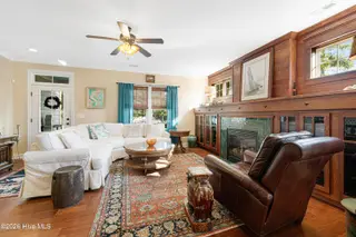 301 Hedrick Street, Beaufort, NC 28516 – photo 9: Living room with gorgeous fireplace