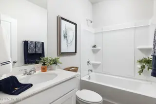 504 Sandy Hollow Drive, Jacksonville, NC 28540 – photo 19: Photo of similar home-Furnished