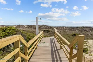 233 Sea Dreams Drive, Atlantic Beach, NC 28512 – photo 16: beachwalkway via pool and shower