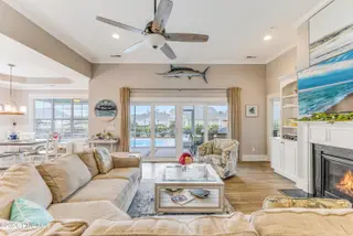 1388 Dunes Boulevard SW, Ocean Isle Beach, NC 28469 – photo 10: GREAT ROOM OUT TO POOL AND POND