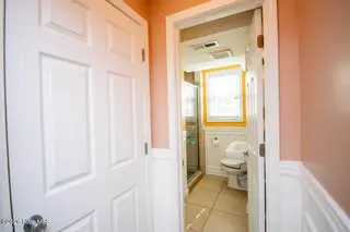 310 Holly Lane, Cape Carteret, NC 28584 – photo 17: Hallway to lower level full bath