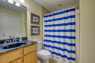 1302 New River Inlet Road, North Topsail Beach, NC 28460 – photo 11: The Greenwood Bath 1