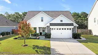 142 Rice Marsh Way, Wilmington, NC 28412 — 3-bedroom home in Bella Port, Wilmington, NC, photo 1 of 62: 142 RICE MARSH WAY - FRONT ELEVATION