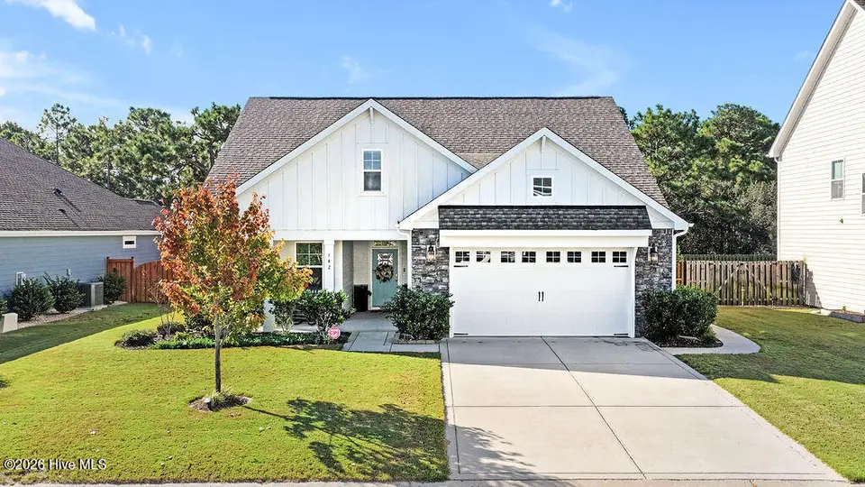 142 Rice Marsh Way, Wilmington, NC 28412 — 3-bedroom home in Bella Port, Wilmington, NC, photo 1 of 62: 142 RICE MARSH WAY - FRONT ELEVATION