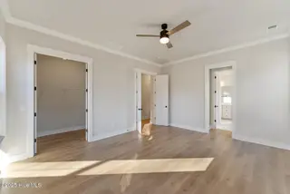 115 S Middleton Drive NW, Calabash, NC 28467 – photo 16: Primary Suite