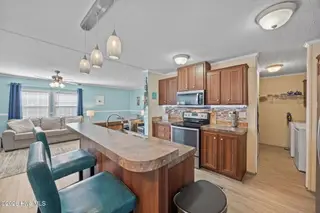 217 NE 75th Street, Oak Island, NC 28465 – photo 17: 21-web-or-mls-IMG_5237