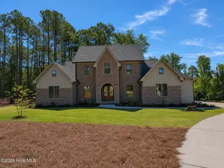 240 Paulson Court, Pinehurst, NC 28374 – photo 1: ChatGPT Image May 10, 2026, 09_17_38 AM