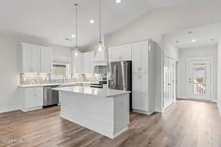 204 NE 33rd Street, Oak Island, NC 28465 – photo 16: 20-web-or-mls-cammediallc.com-27