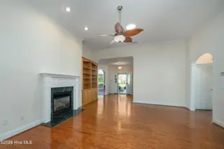 202 Longmeadow Drive, Wilmington, NC 28412 – photo 5: Living Room w/ Built in/Fireplace