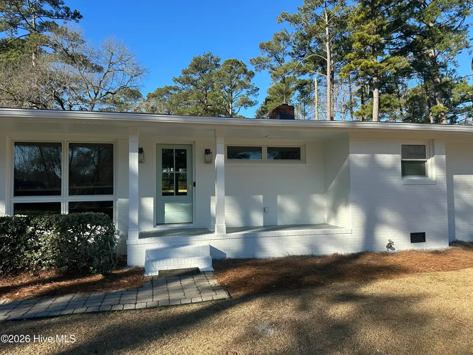 305 Country Club Drive, Trent Woods, NC 28562 – photo 1 of 39: White Brick Ranch