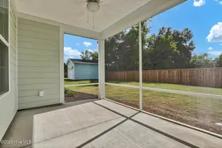 174 Planters Walk, Hampstead, NC 28443 – photo 22: Screen Back Porch