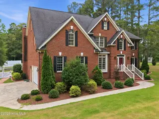 4076 Mobleys Bridge Road, Grimesland, NC 27837 – photo 2: 2-web-or-mls-DJI_20260622143610_0022_D