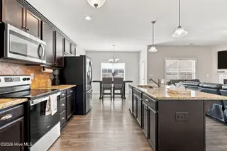 613 Knoll Circle, Greenville, NC 27858 – photo 22: Kitchen view to Combo Kit