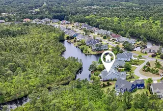 4221 Skeffington Court, Southport, NC 28461 – photo 6: Large Wooded Area Behind Home