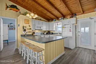 1011 W Beach Drive, Oak Island, NC 28465 – photo 16: 30-web-or-mls-IMG_2401
