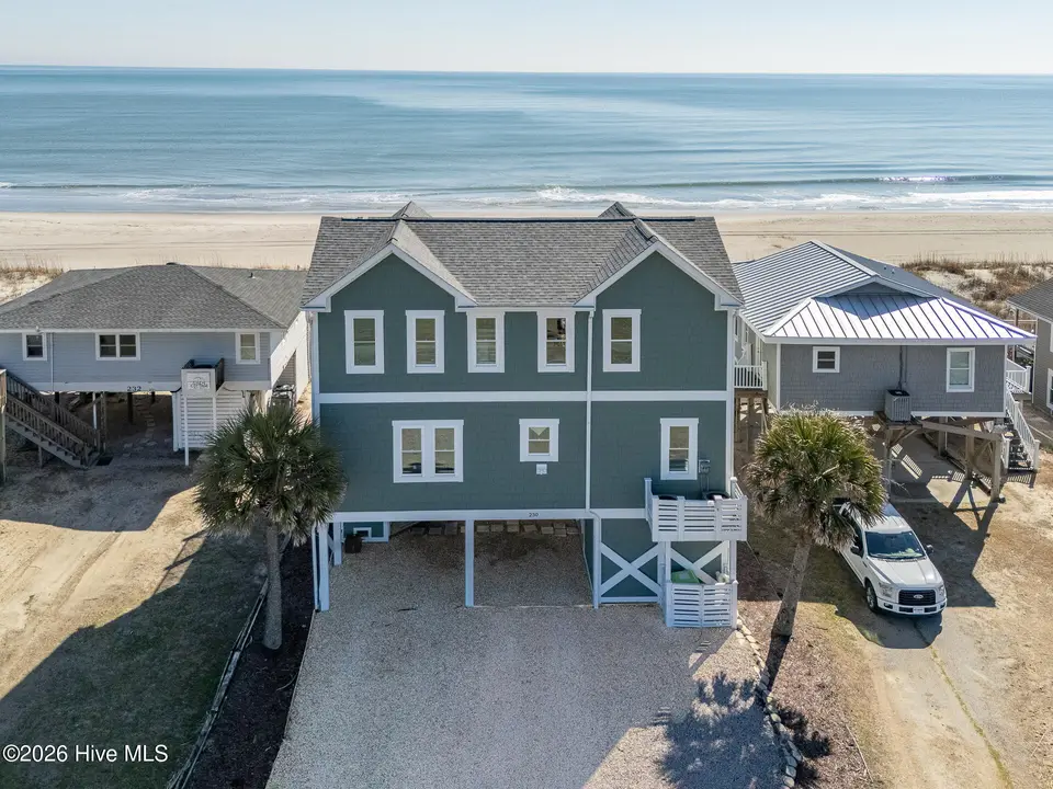 230 Ocean Boulevard E, Holden Beach, NC 28462 – photo 1 of 51: DJI_20260228151748_0071_D-HDR