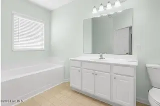 221 Palomino Lane, Swansboro, NC 28584 – photo 18: palomino_decluttered_bathroom