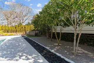 605 Ravenswood Road, Hampstead, NC 28443 – photo 16: Imported black beach stones