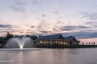209 Coastal Dune Court, Wilmington, NC 28412 — 3-bedroom home in Riverlights, Wilmington, NC, photo 18 of 27: Lakehouse Dusk