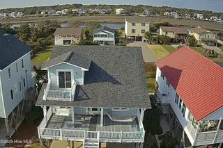 2519 W Dolphin Drive, Oak Island, NC 28465 – photo 5: Dolphin Front (2)