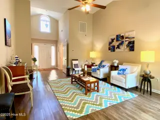 11 Court 11 Northwest Drive NW, Carolina Shores, NC 28467 — 3-bedroom home in Carolina Shores, Carolina Shores, NC, photo 5 of 28: 6-Living Room 2