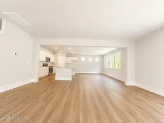 8611 Blue Haw Way Lot 124, Leland, NC 28451 — 5-bedroom home in Indigo Preserve, Leland, NC, photo 10 of 33: Great room area