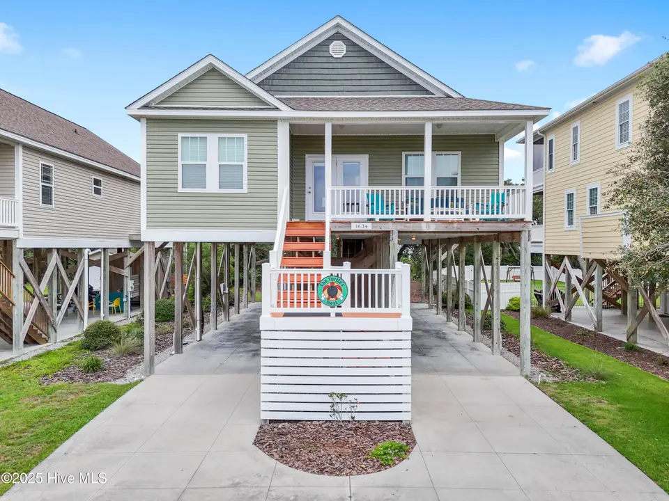 1634 E Dolphin Drive, Oak Island, NC 28465 – photo 1 of 59: 1634EDolphinDr - 2