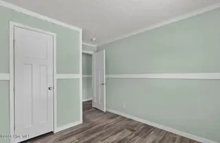 6823 Lewis Drive SE, Winnabow, NC 28479 – photo 19: Bedroom 2