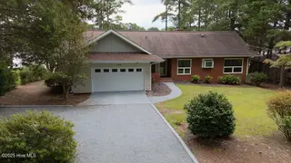 238 Pine Ridge Drive, Whispering Pines, NC 28327 – photo 2: DJI_20250916112944_0022_D
