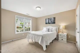 117 Lincoln Place Circle, Leland, NC 28451 – photo 16: Primary bedroom downstairs