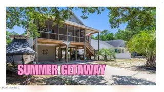 126 NE 1st Street, Oak Island, NC 28465 – photo 1: 126 ne 1st - slides
