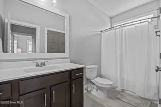 6942 Campbells Ridge Drive SE, Leland, NC 28451 – photo 22: 27_bathroom