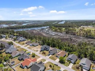 5014 N Hampton Drive SE, Southport, NC 28461 – photo 6: 6-web-or-mls-DJI_20260415124143_0398_D