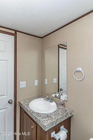 102 Bonnie Farms Road, Dudley, NC 28333 — 3-bedroom manufactured home in Bonnie Farms, Dudley, NC, photo 11 of 20: IMG_3635