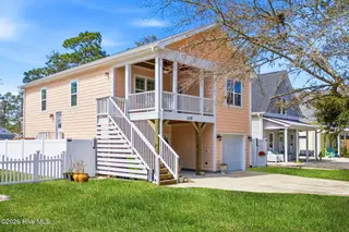 135 NE 75th Street, Oak Island, NC 28465 – photo 3: Front