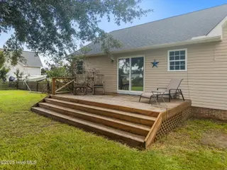 313 Oakmont Drive, Hampstead, NC 28443 – photo 9: 9-web-or-mls-DJI_20250811101338_0200_D