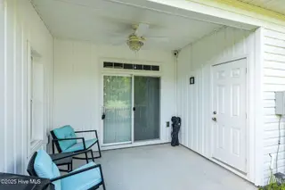 702 Pirates Landing Drive, Beaufort, NC 28516 – photo 9: Covered Patio w/ Storage Closet