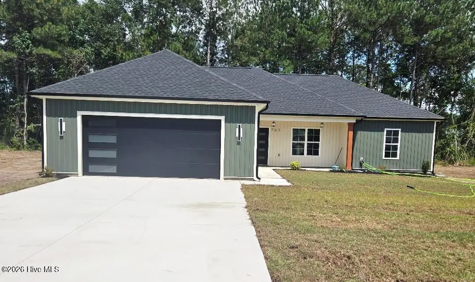 703 Windchime Court, Kinston, NC 28504 – photo 1 of 22: 20260630_151944_resized