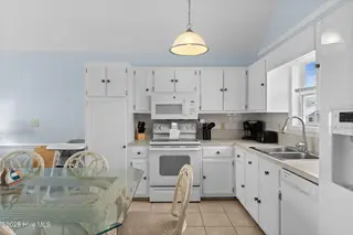 3229 E Beach Drive, Oak Island, NC 28465 – photo 13: 18-web-or-mls-CAMMediaLLC.com 3229-21