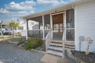 802 E Oak Island Drive, Oak Island, NC 28465 – photo 6: Screenedin Porch-009-018-1500x1000