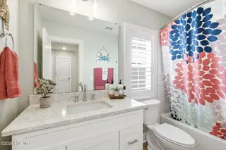 135 NE 75th Street, Oak Island, NC 28465 – photo 22: 3rd Bathroom