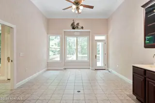 86 Plantation Passage Drive SE, Bolivia, NC 28422 — 4-bedroom home in Winding River Plantation, Bolivia, NC, photo 7 of 77: Living Room