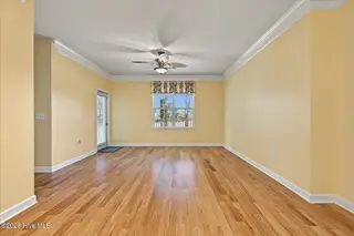 250 Woodlands Way Unit 14, Calabash, NC 28467 — 3-bedroom condo in Woodlands @ Crow Creek, Calabash, NC, photo 16 of 49: Living Room
