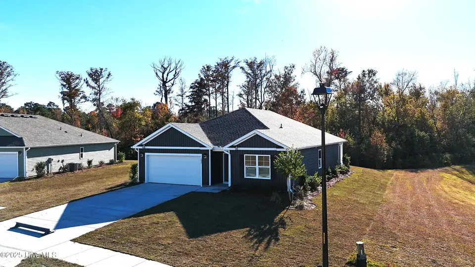 1097 Sandy Heights Loop Lot 41, Navassa, NC 28451 – photo 1 of 30: DJI_20251105143405_0002_D