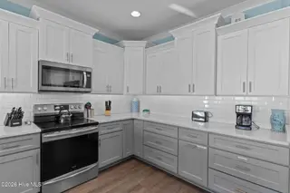 4321 E Beach Drive, Oak Island, NC 28465 – photo 13: 31-web-or-mls-BTS01995